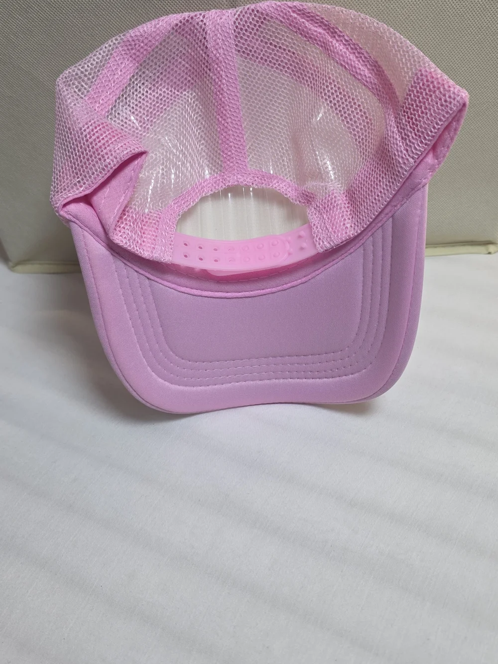 0909 Put It On My Husband's Tab Pink Trucker Hat